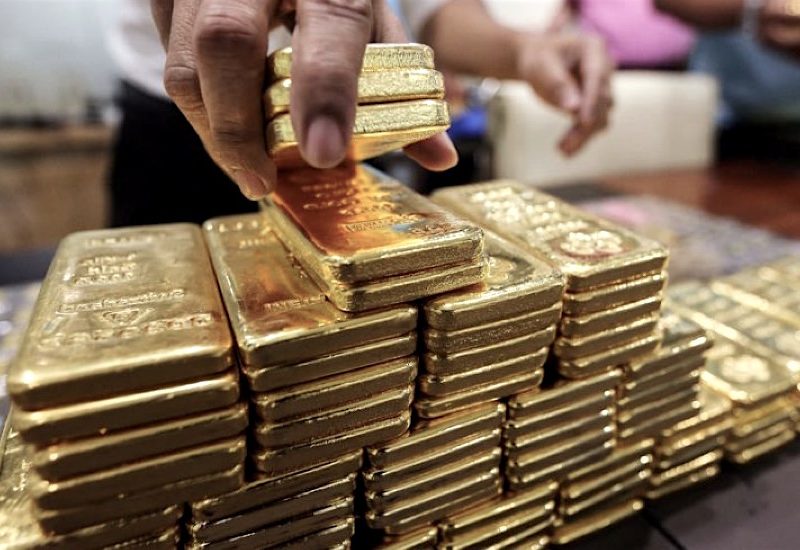 PRECIOUS-Gold gains after U.S. Fed chief calms rate hike jitters